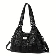 luxury handbag women featuring multiple pockets a designer